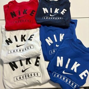 kids Nike Lacrosse long sleeve shirts in Red, Blue, White, and Navy